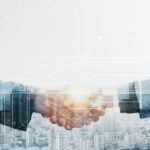 business-partners-handshake-global-corporate-with-technology-concept_53876-102615