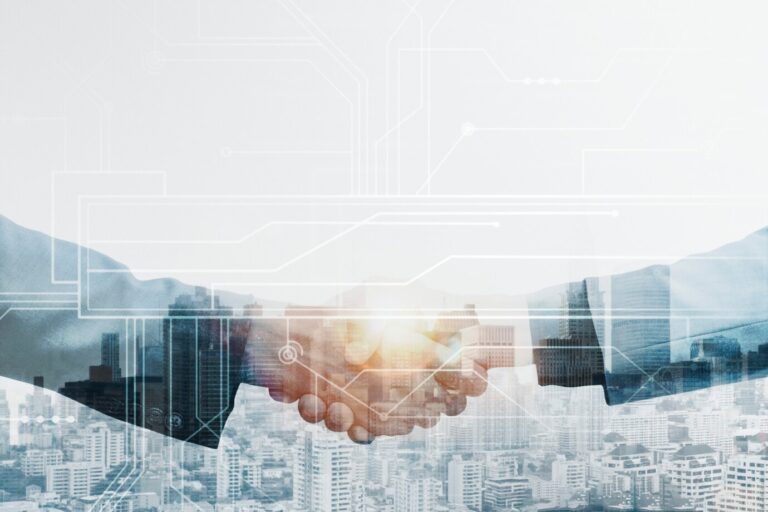 business-partners-handshake-global-corporate-with-technology-concept_53876-102615